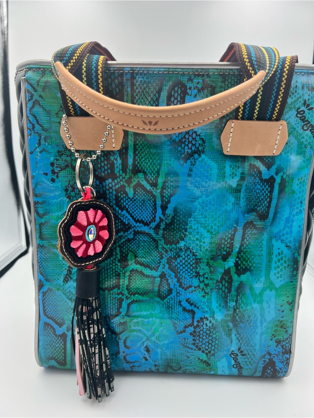 Consuela Teal and Blue Snake-Print Tote with Tan Handles and Floral Tassel